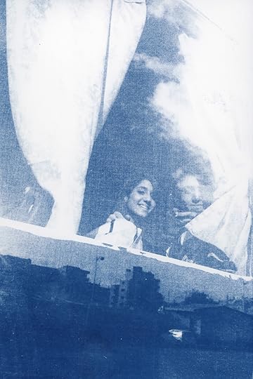 Last image of my brother and me, taken by our father in Syria in 2015 on a bus, with the city's reflection in the window. Treated in cyanotype as part of the project (Towards A Light 2021).