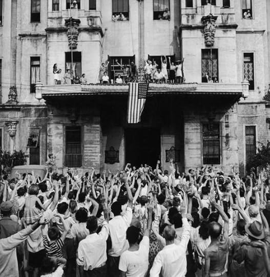 Internees at the University of Santo Tomas in the Philippines celebrate their liberation, 5 February 1945 (LIFE images, public domain)