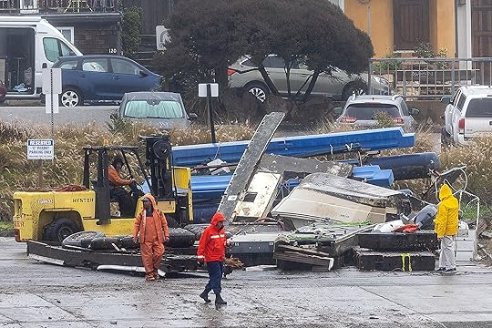 A debris pile grows in the Santa Cruz Harbor parking...