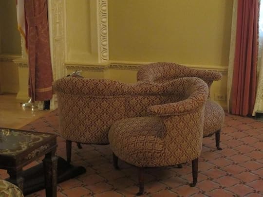 three-person chair in parlor