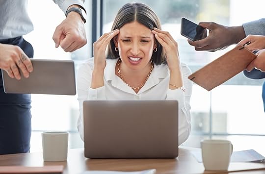 Woman getting stressed from multitasking