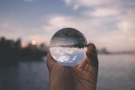 Viewing a city through an orb, inverted. Can You Choose to Shift Your Perspective?