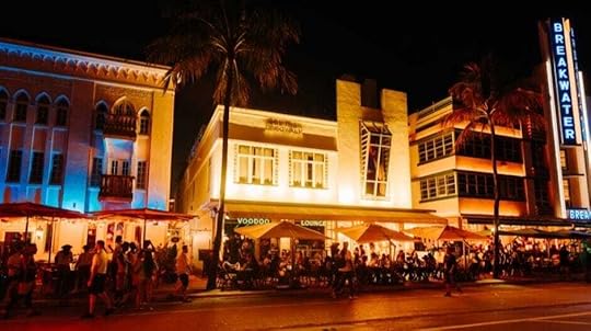 As the sun sets, South Beach transforms into a lively hub
