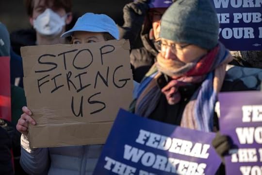 Demonstrators rally in support of federal workers