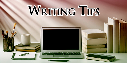 A writer's desk with a laptop, pens and pads, books, a coffee cup and a pencil pot.