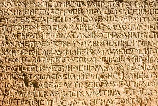Some ancient writing carved into a stone tablet