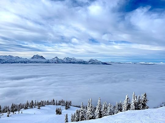 inversion of clouds in front of mountains