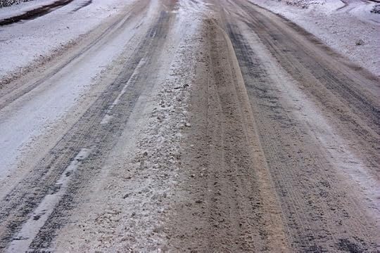 Slushy, slippery road with a little bit of sanding on it.