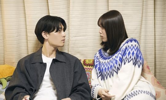 Hagiwara with his girlfriend in When It Rains, It Pours. 