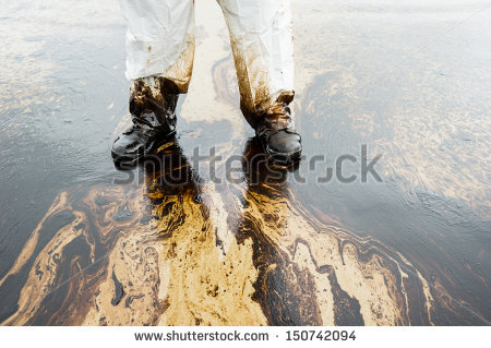 stock-photo-crude-oil-on-oil-spill-accident-on-ao-prao-beach-at-samet-island-on-july-in-rayong-thailand-150742094
