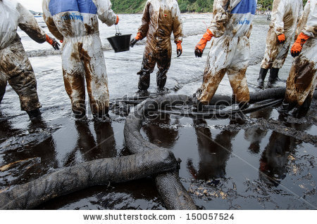 stock-photo-crude-oil-on-oil-spill-accident-on-ao-prao-beach-at-samet-island-on-july-in-rayong-thailand-150057524