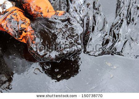 stock-photo-crude-oil-on-oil-spill-accident-on-ao-prao-beach-at-samet-island-on-july-in-rayong-thailand-150738770