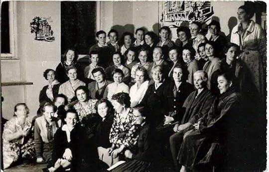 A group of people posing for a photoDescription automatically generated