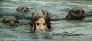 image of a girl's head among seal heads in the water