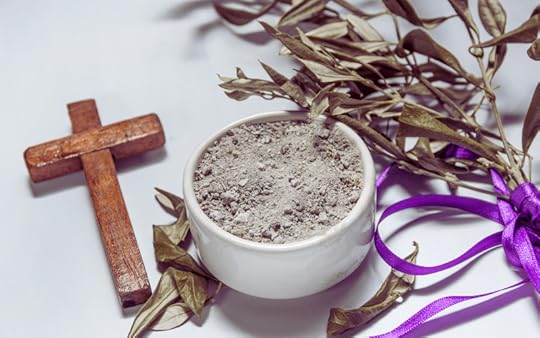 Lenten Ashes in a white bowl and brown cross