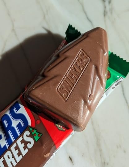 A vaguely tree-shaped chocolate that says 