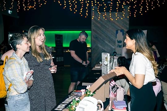 Indie author Laura Catherine (left), and me (to the right of Laura) chat with Victoria from Titlepieces