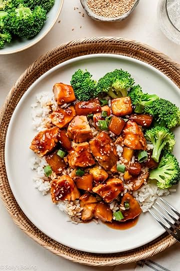 baked pineapple chicken teriyaki on white plate with broccoli and white rice.