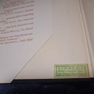 inside of cover showing green Dymock's sticker
