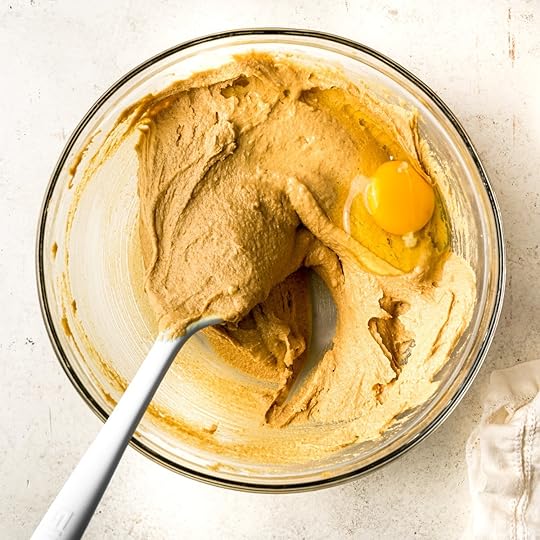 Cookie dough with an egg on top.