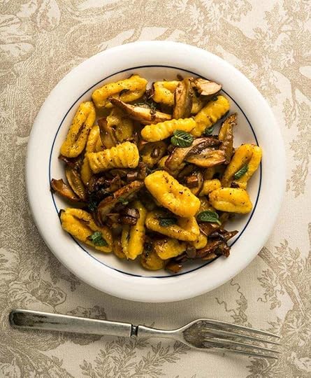 A bowl of butternut squash gnocchi with mushrooms