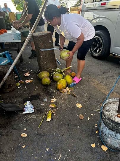 chopping coconuts