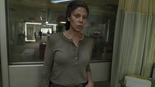 Marlene (Merle Dandridge) breaks hard news to Joel in The Last of Us.