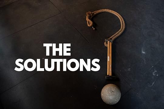 Gym equipment arranged in the shape of a question mark with the words