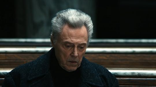 Burt with his head down sitting on Severance