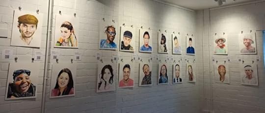 photo of some of the first fifty paintings exhibitied at Three Storeys 