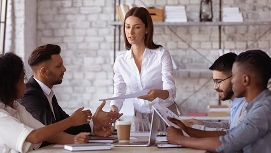 professional HR person handing out mandatory employee handouts to stay in compliance