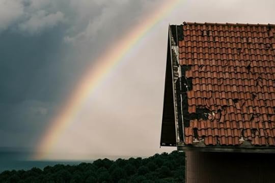 damaged roof and rainbow