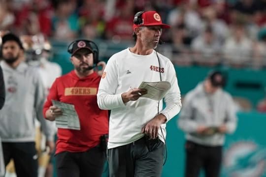 San Francisco 49ers head coach Kyle Shanahan walk the sidelines during the first half of an NFL football game against the Miami Dolphins, Sunday, Dec. 22, 2024, in Miami Gardens, Fla. (AP Photo/Lynne Sladky)