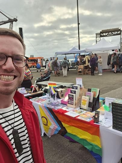 Selfie with books on a market stall table