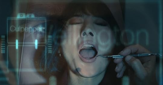 Gemma getting dental work with file names superimposed over her face on Severance