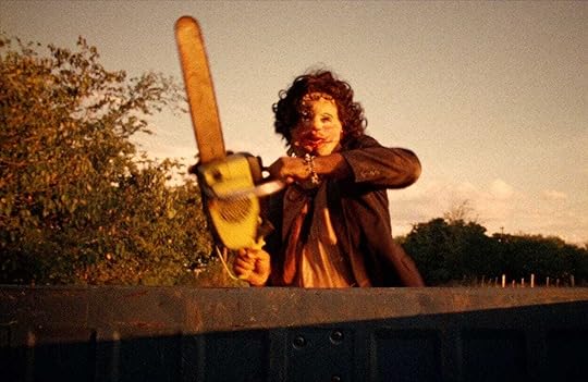 Leatherface brandishes his chainsaw in