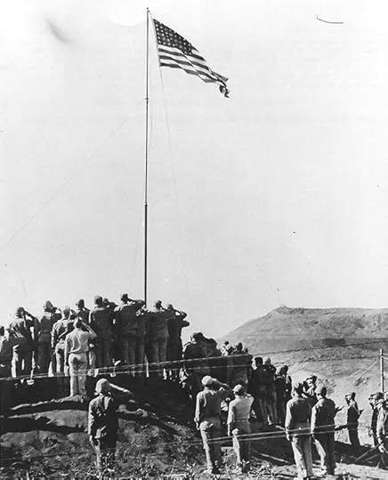 Flag raising at US Headquarters on Iwo Jima after US Navy military government is established, 14 Mar 1945. (US Naval History and Heritage Command: NH 104584)