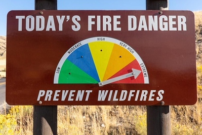 Road sign stating that fire danger is Extreme Today