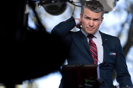 Defense Secretary Pete Hegseth prepares to give a television interview
