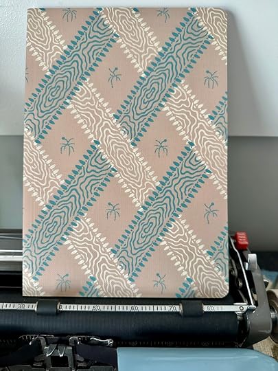 Notebook with trellis wallpaper pattern