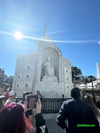 people taking photos on the St. Louis Cemetery No. 1 Tour