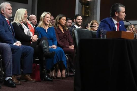 Phil Hegseth listens as Pete Hegseth appears before the Senate Armed Services Committee for his confirmation hearing
