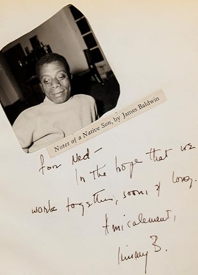 A faded page of blank paper, with a pasted-in photo of James Baldwin and a few lines of Baldwin's handwritten note to Rorem.