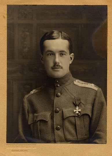 Young officer in the Russian army during World War One. He is wearing a medal in the shape of a cross.