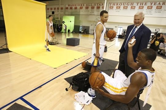 Golden State Warriors gaurd Stephen Curry shares a laugh with Jerry West, center, and Harrison Barnes, right, during media day on Monday, Oct. 1, 2012 in Oakland, Calif. (Aric Crabb/Staff)