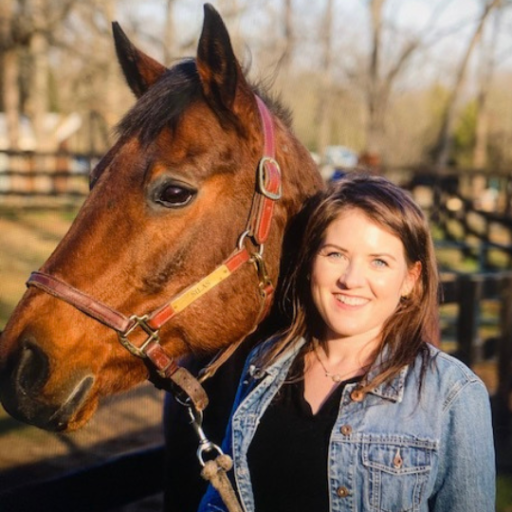 author, Sarah Hickner, poses with her horse Silas.