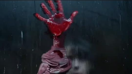 image of a bloody hand on a steamed window in bring her back trailer