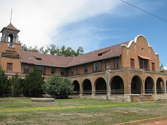 Las Vegas, New Mexico USA - July 25, 2013: Mission Revival style La Castaneda Hotel opened 1899 by Harvey House for Atchison Topeka Santa Fe Railway. Railroad Avenue Historic District. Closed in 1948.