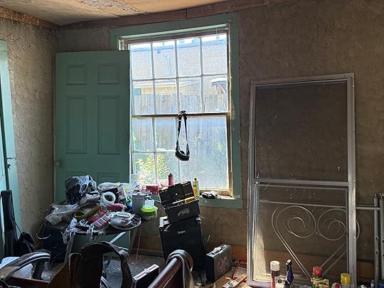 a room with a window and a door