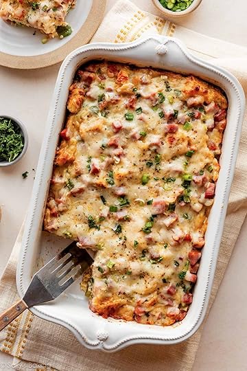 ham, egg, and cheese breakfast strata in white dish.